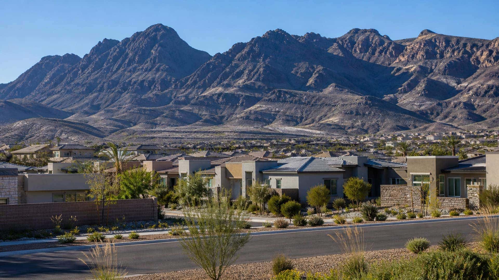 Mountains Edge southwest Las Vegas homes below dark mountain ridge